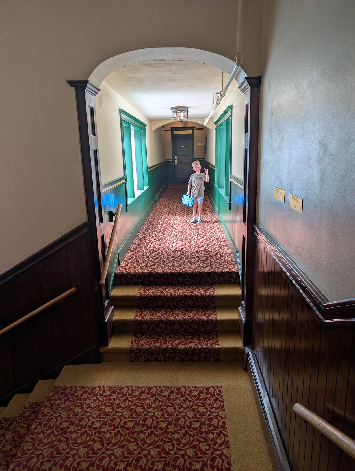Reid in a hallway at the Hotel St. Michael